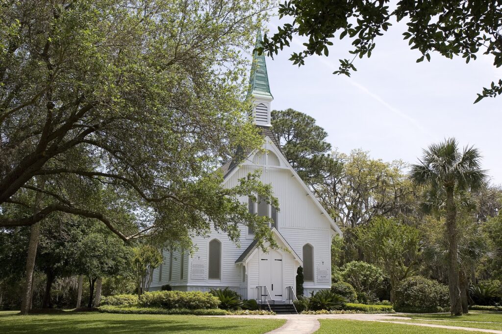 A small country church through the trees